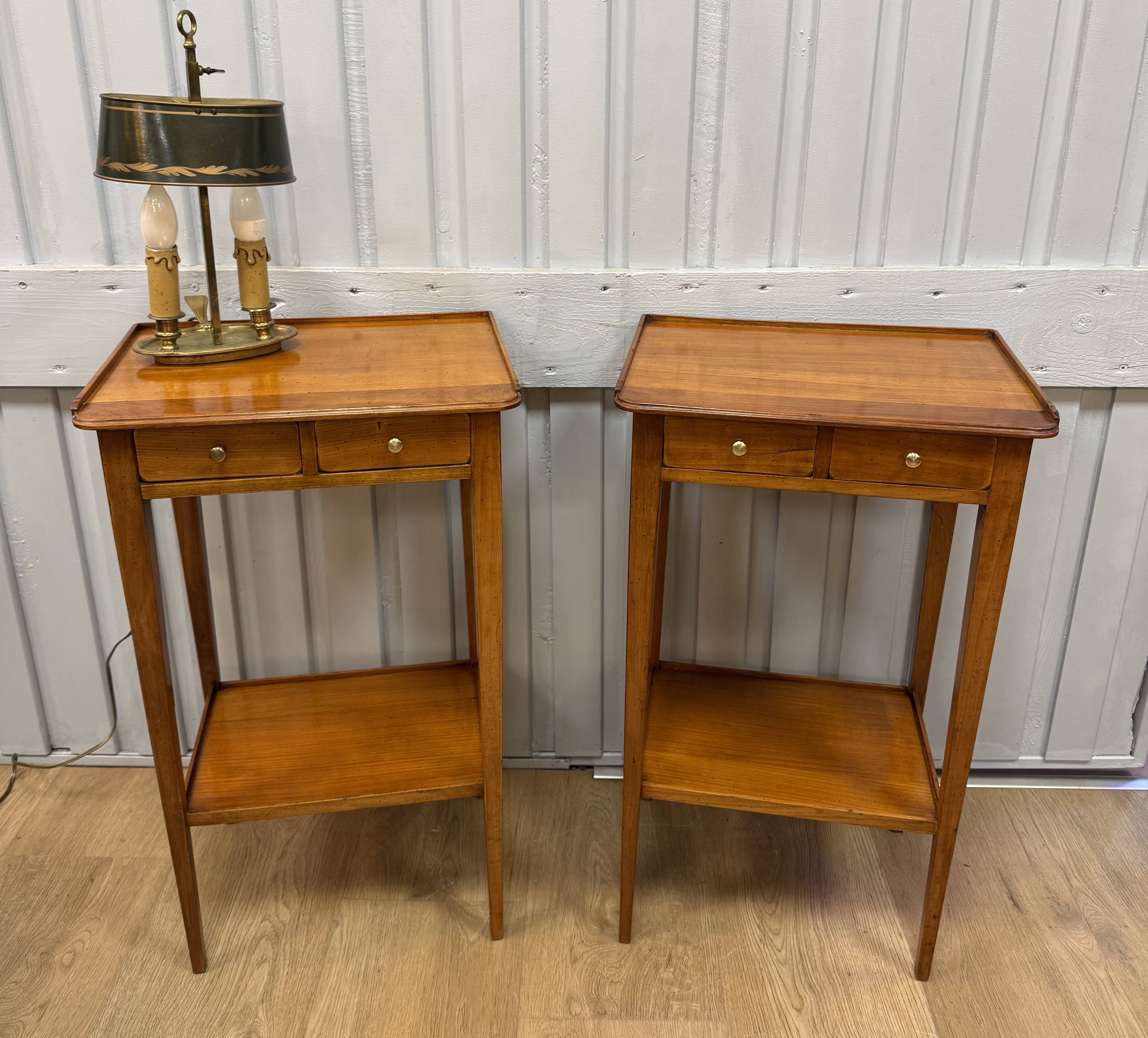 Pair of small side tables in cherry wood.