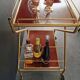 Vintage rolling dessert in gold metal (bar on wheels)