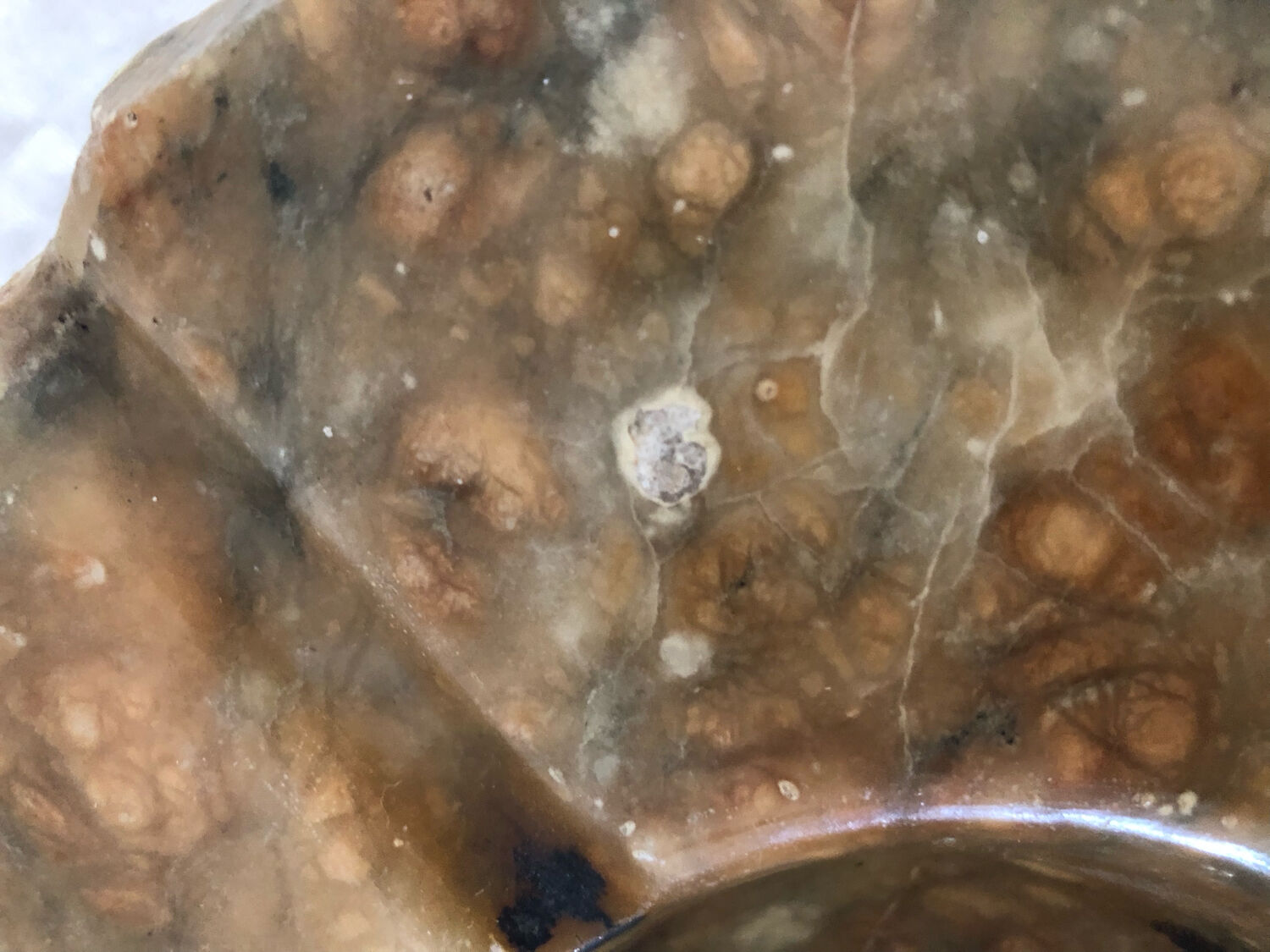 Polished and raw marble ashtray