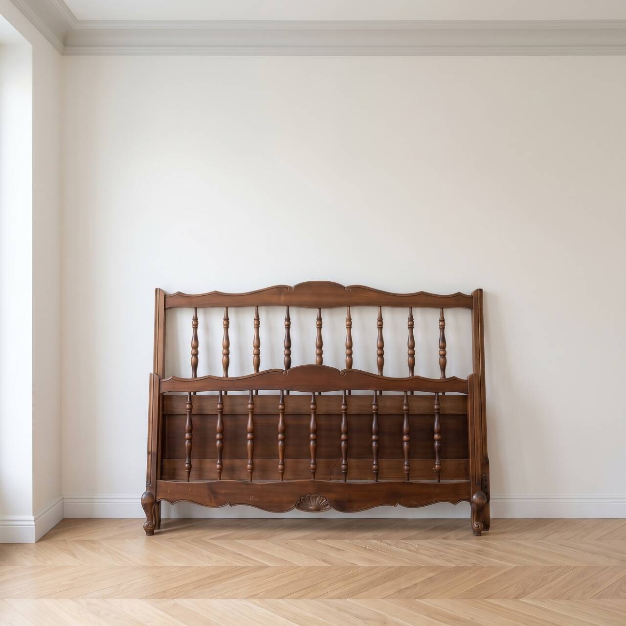 Double bed frame in antique Louis XV style made of solid wood.