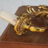 Pair of Louis XV style sconces in bronze with 1 arm of light