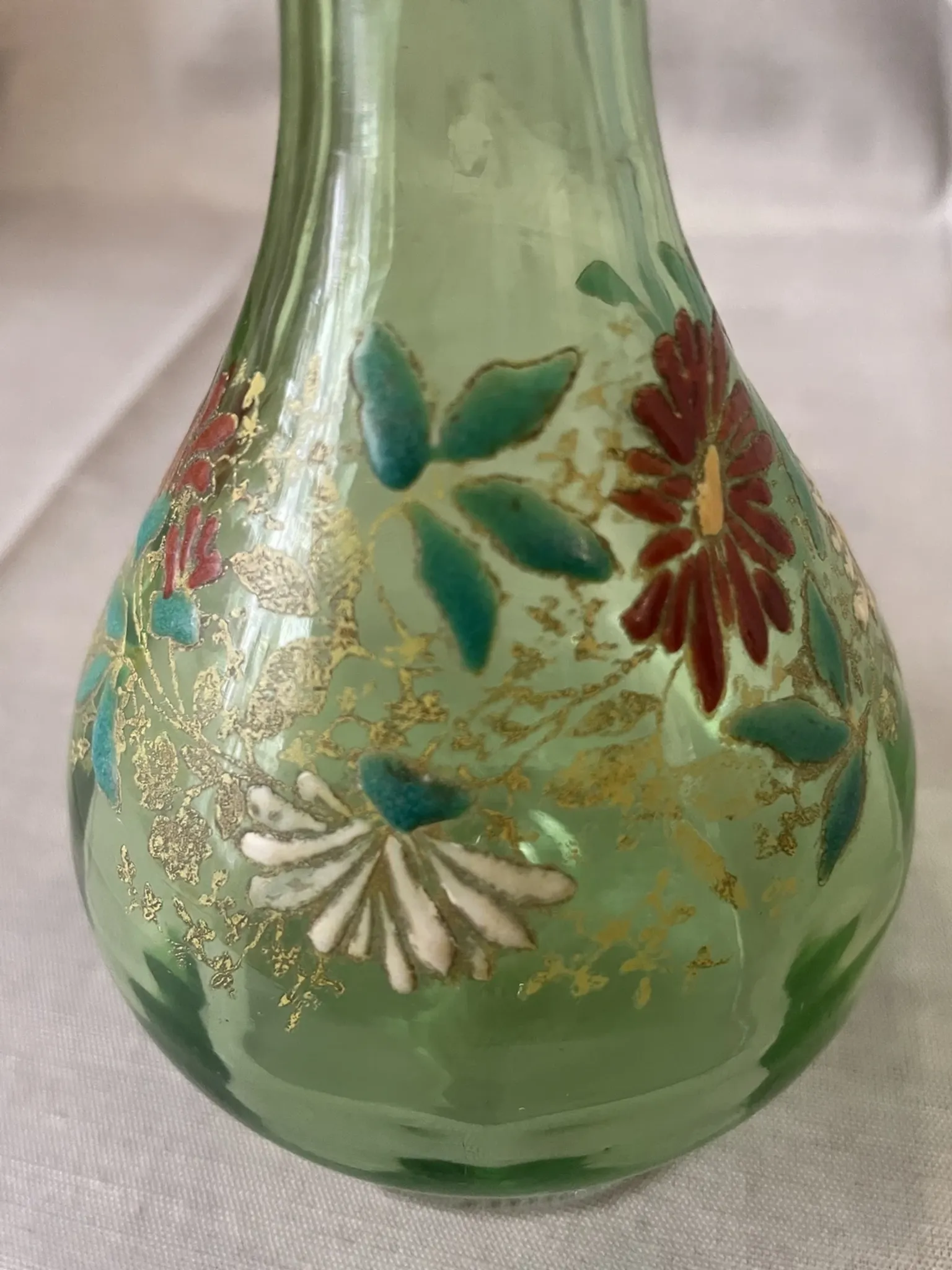 Liqueur carafe in ouraline with floral enamel decoration.