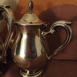 Set of 2 silver metal pourers punched and numbered