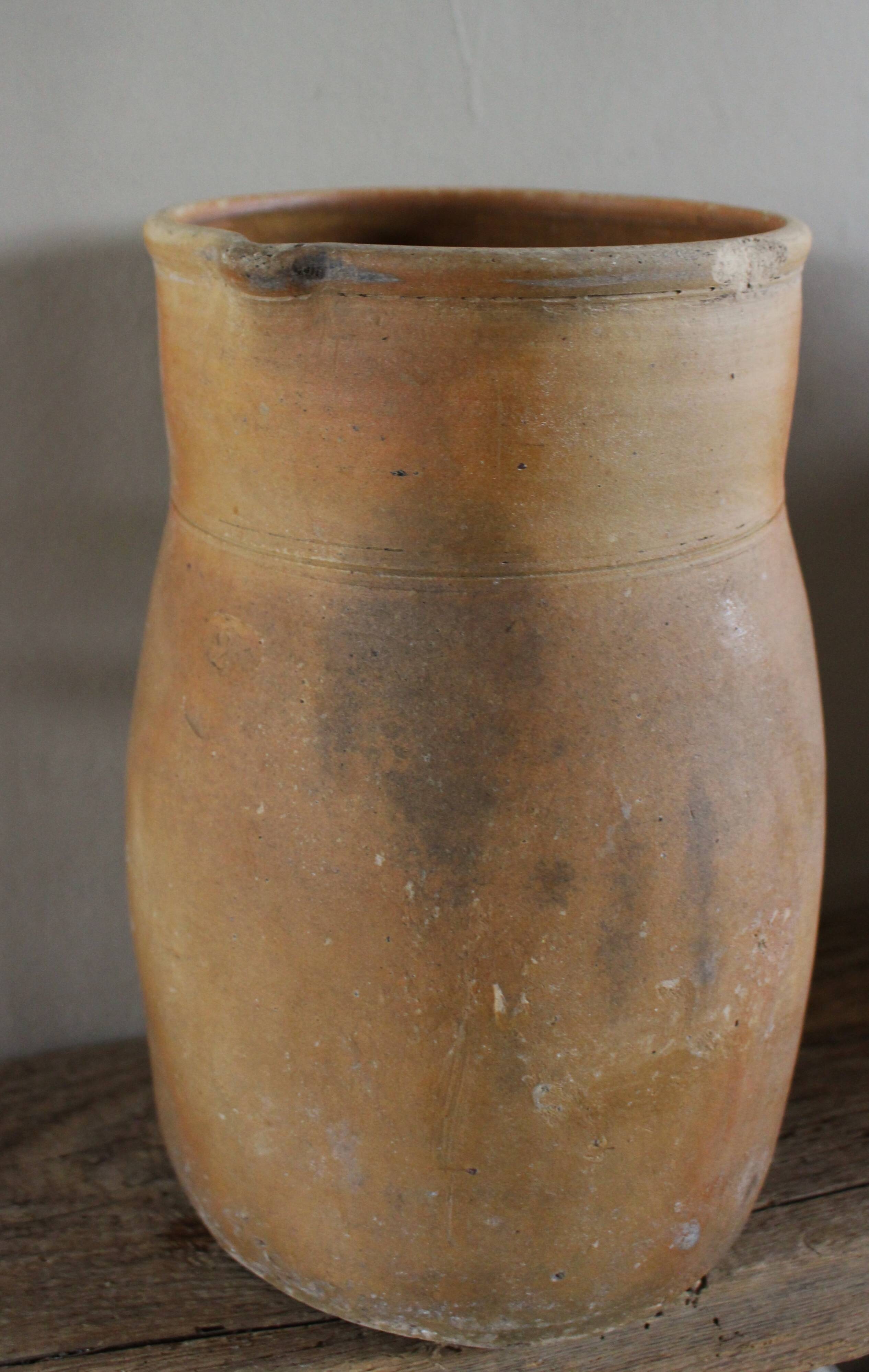 Vintage artisanal terracotta jug