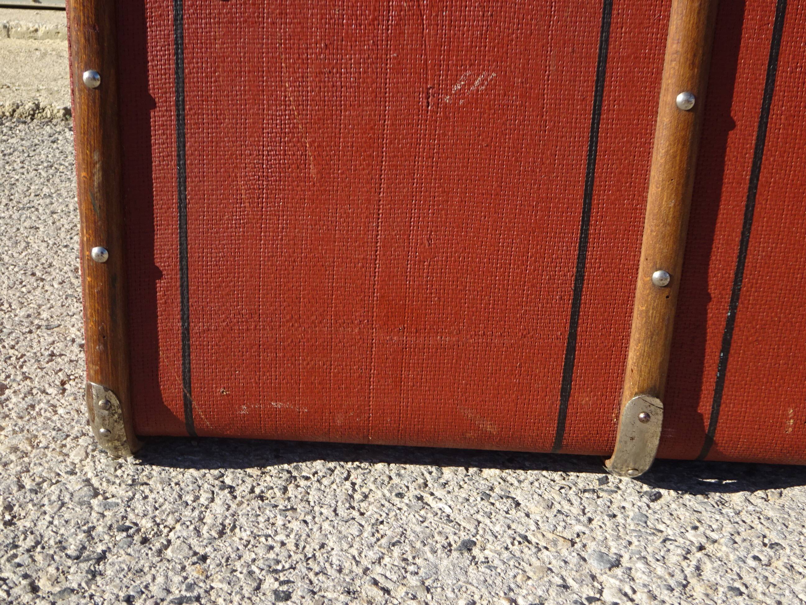 Old curved travel trunk