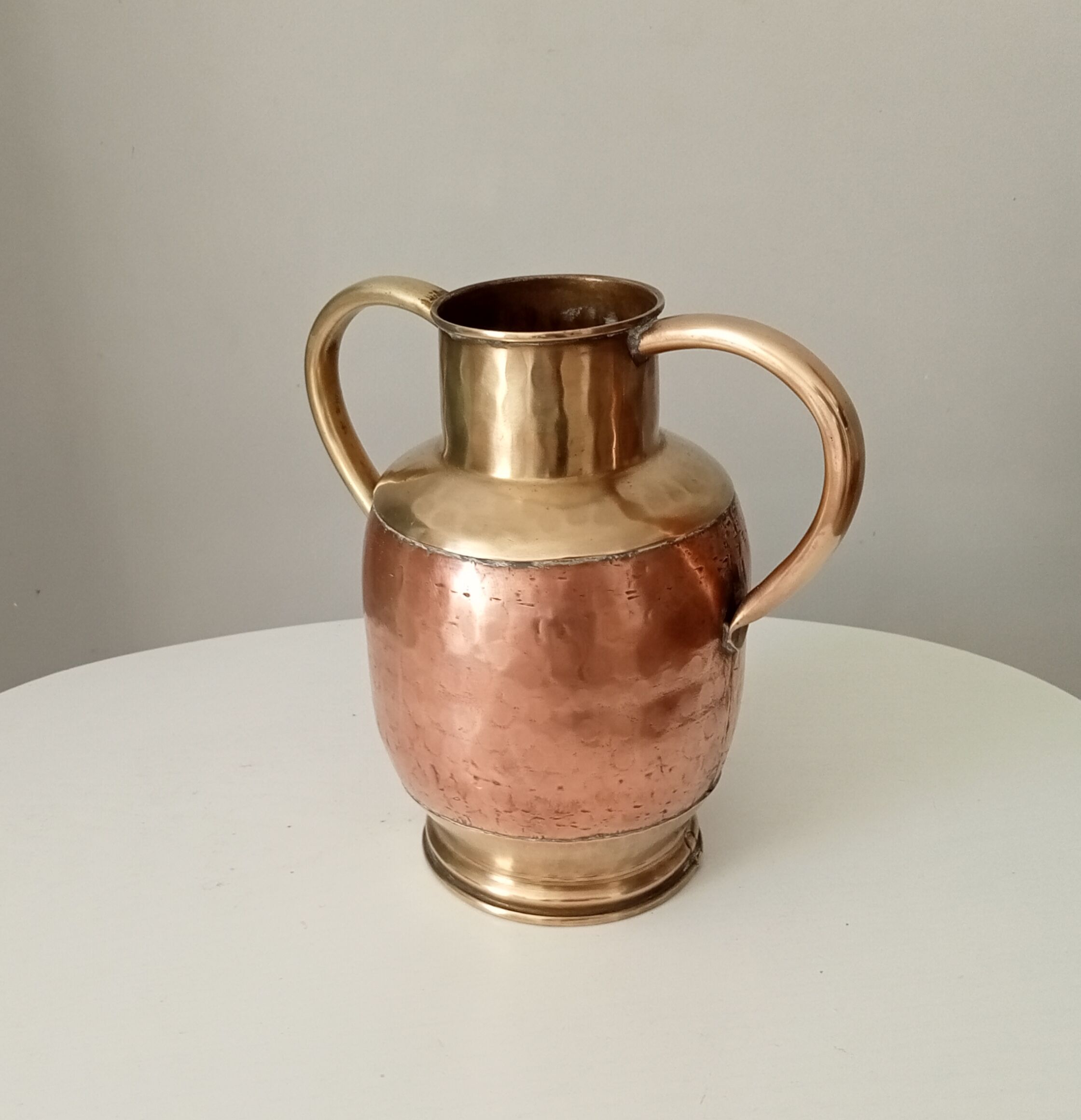 Antique amphora vase in brass and copper