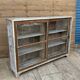 Teak display cabinet with sliding doors