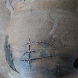 Sandstone lamp base with fleur-de-lis coat of arms
