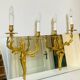 St Louis XV wall lights in solid gilded bronze with curved branches.