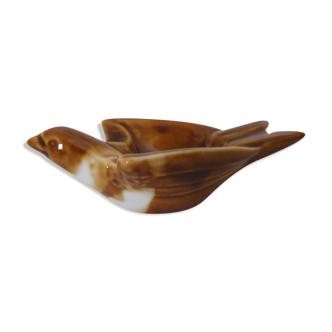 Empty pocket or ashtray model bird