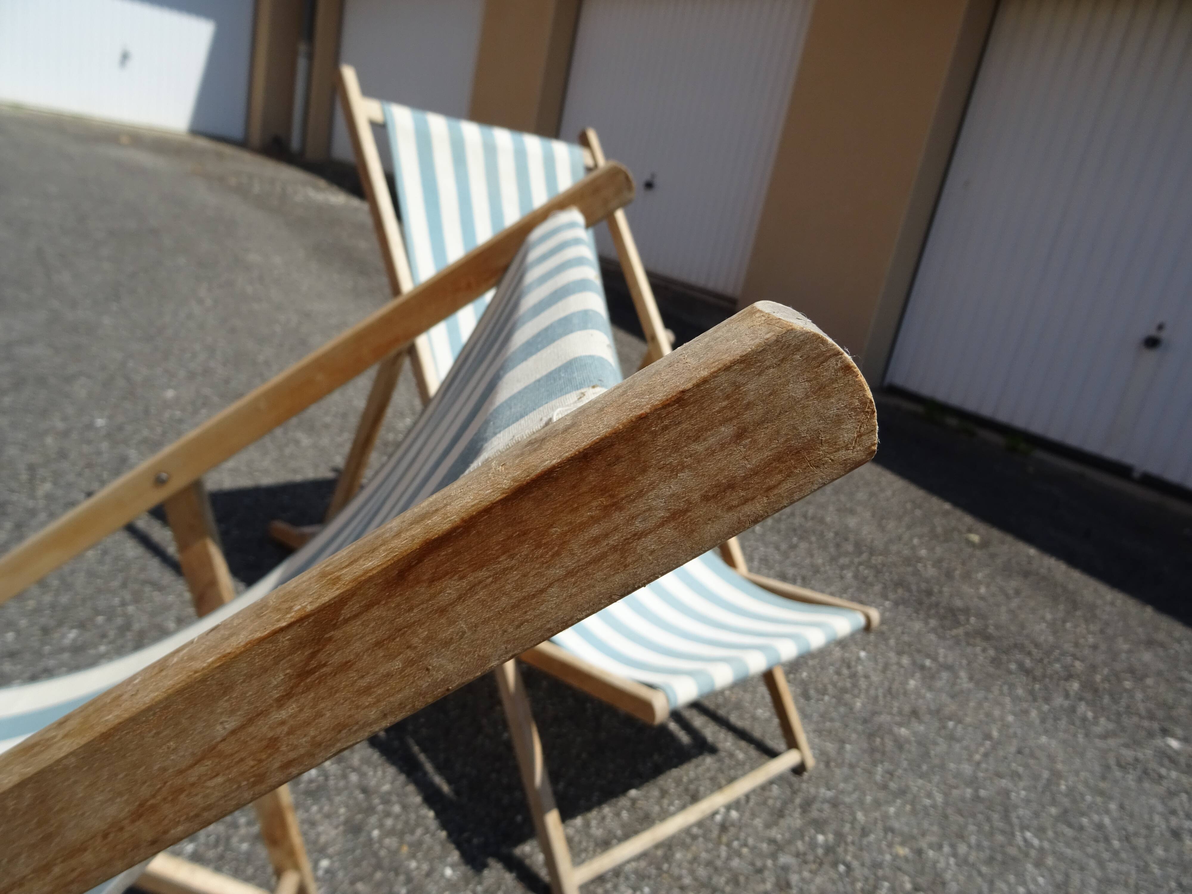 Pair of sun loungers with vintage blue blue stripes