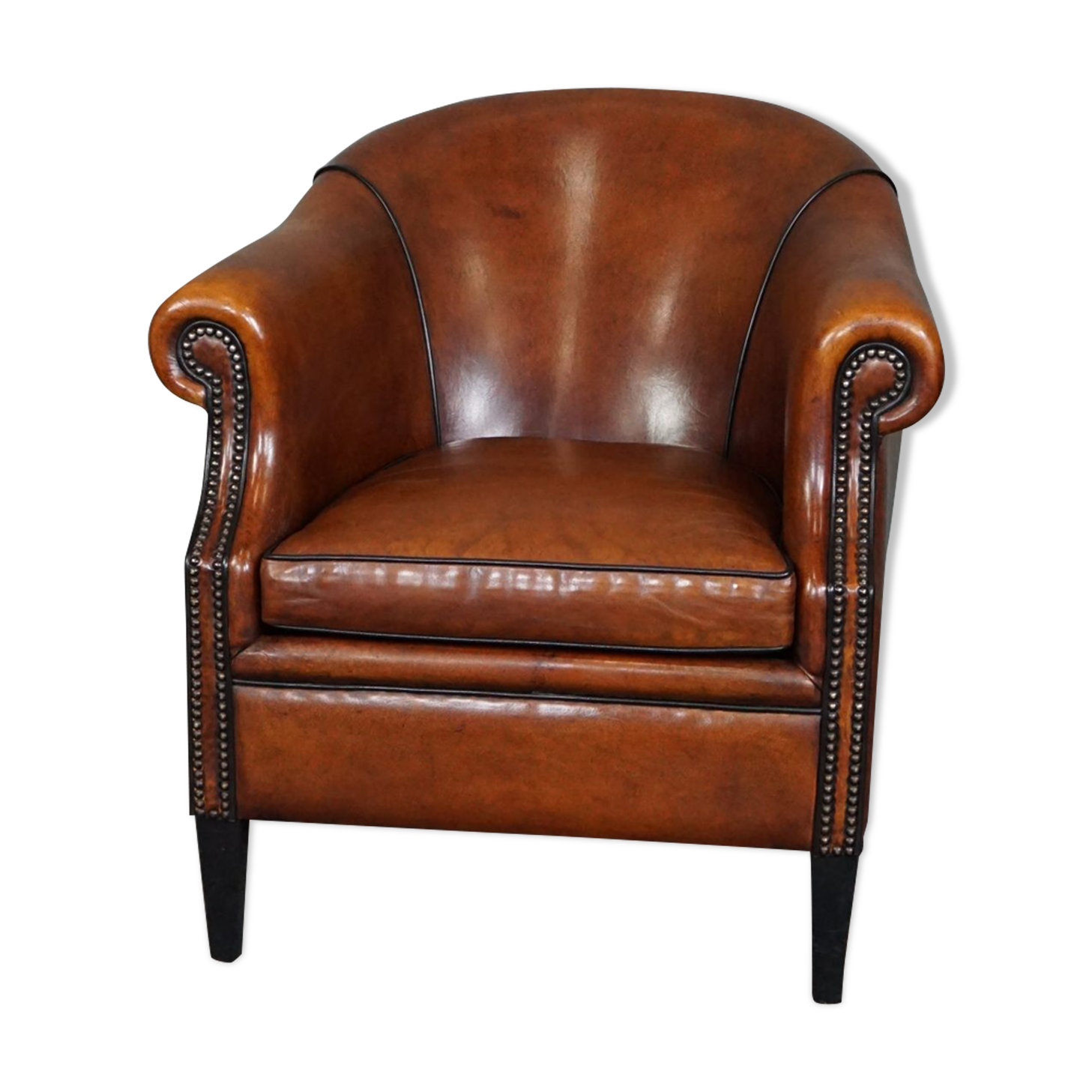 Leather club chair with black piping