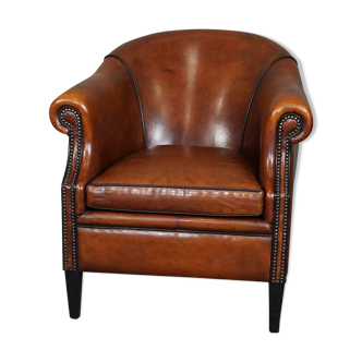 Leather club chair with black piping