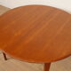Vintage round dining table | extendable | teak | 125 - 185 cm