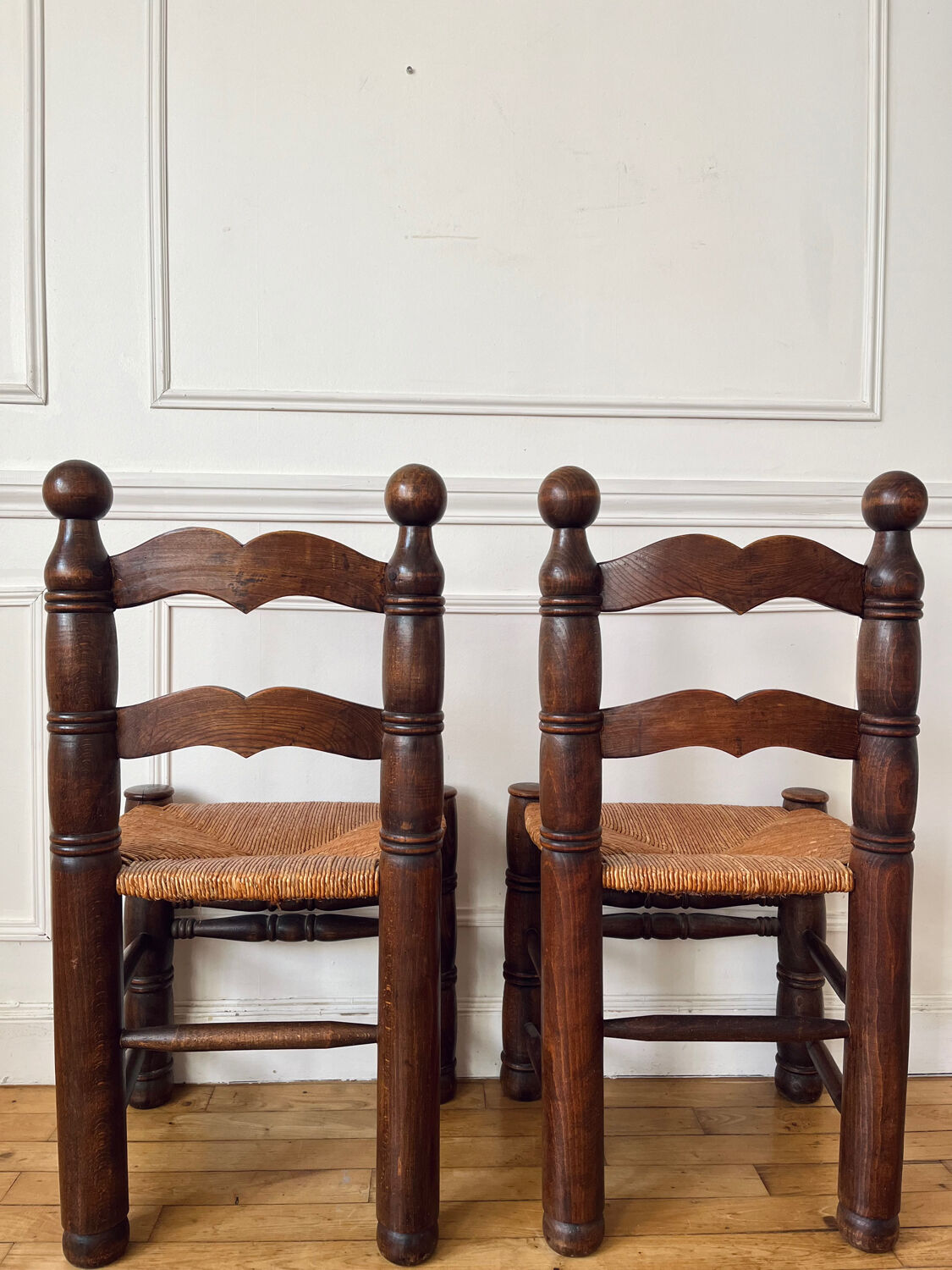 Pair of rustic chairs in the style of Charles Dudouyt.