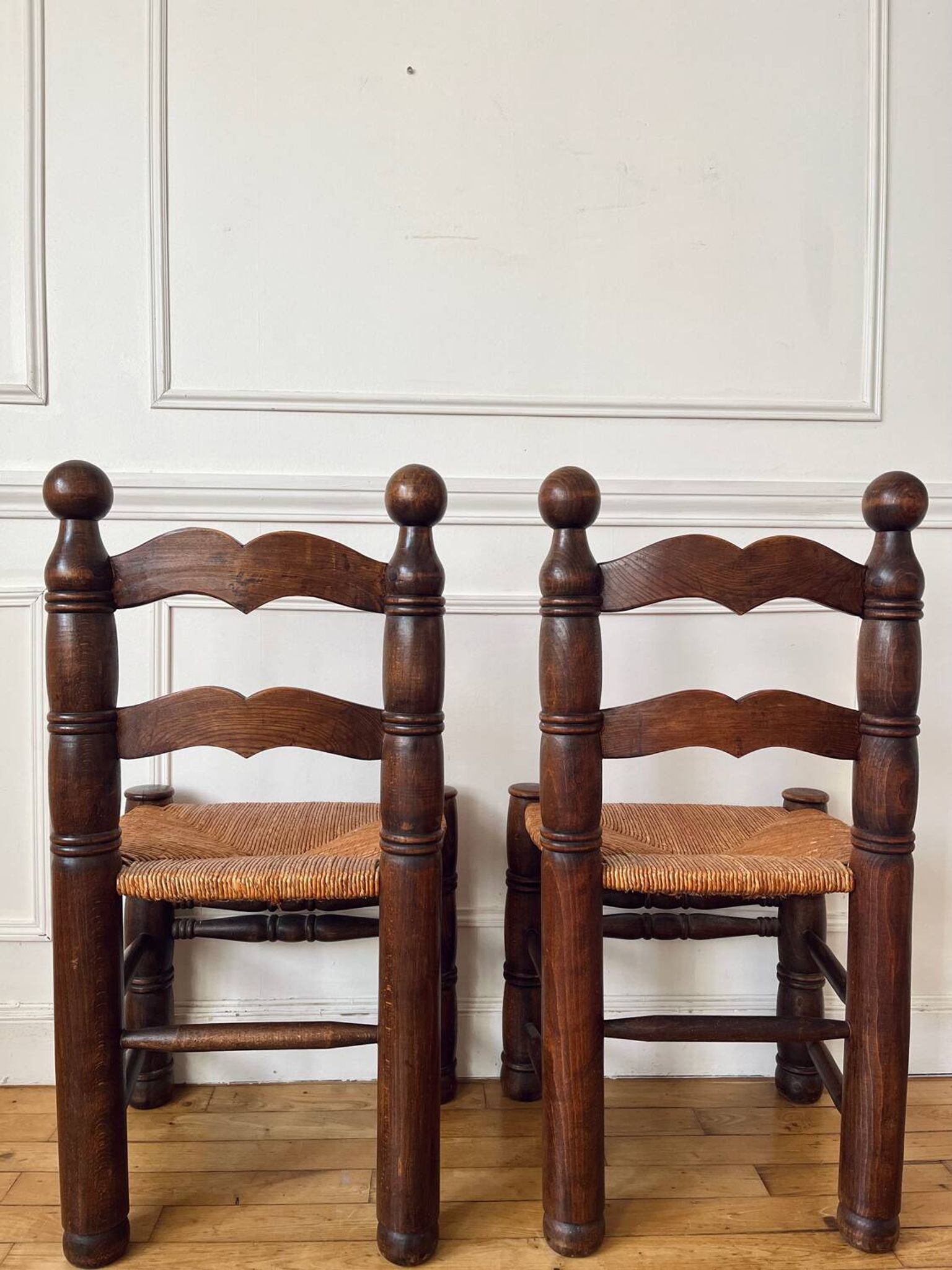 Pair of rustic chairs in the style of Charles Dudouyt.