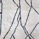Handmade Moroccan rug from Oued Zam, size 160 x 240 cm.