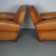 Pair of French Cognac Moustache Back Leather Club Chairs, 1950s