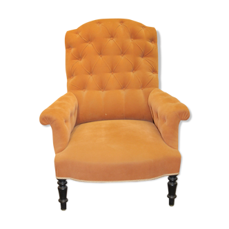 Fauteuil capitonné