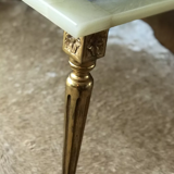 Coffee table in onyx and brass