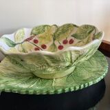 Cherry-decorated drainer fruit cup with its leaf-shaped dish