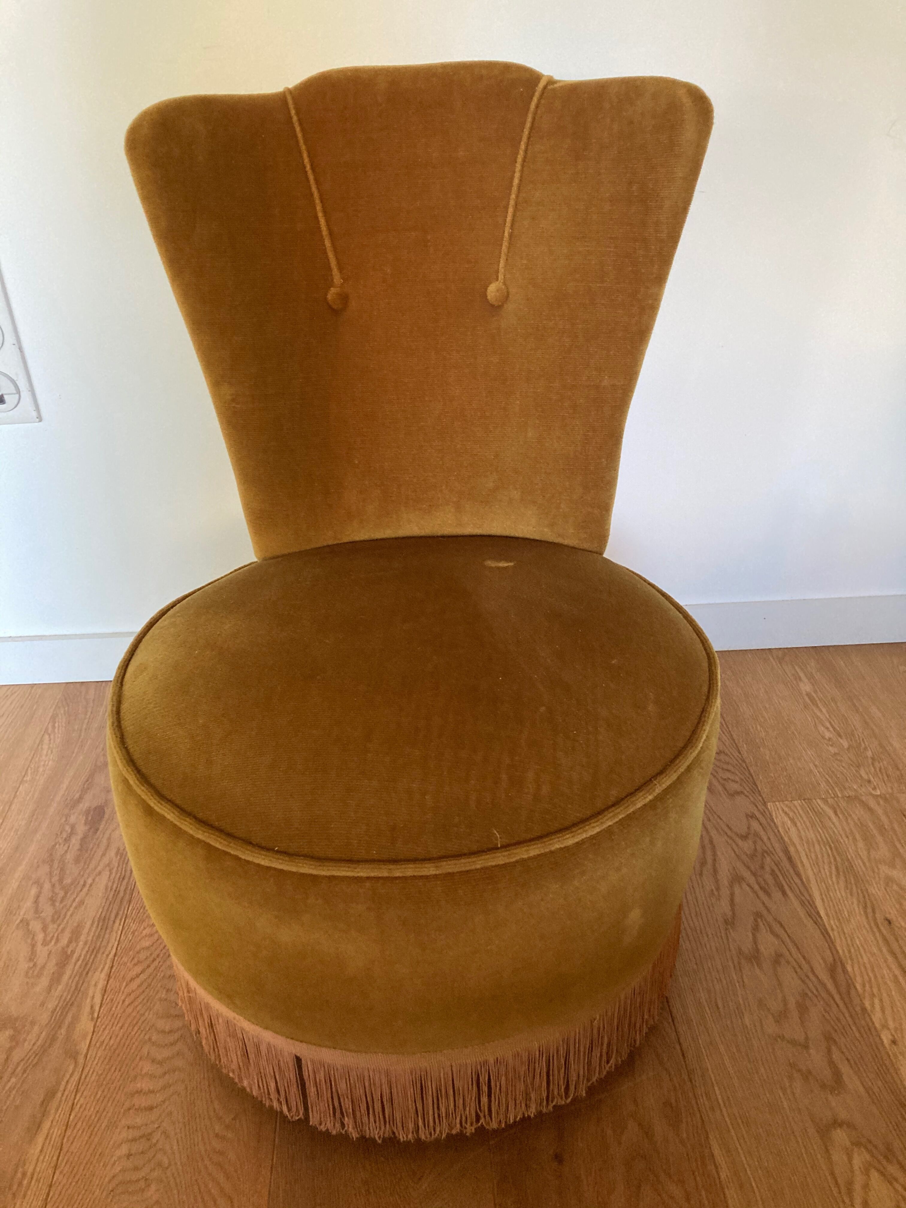 Pair of armchairs toad fringed .