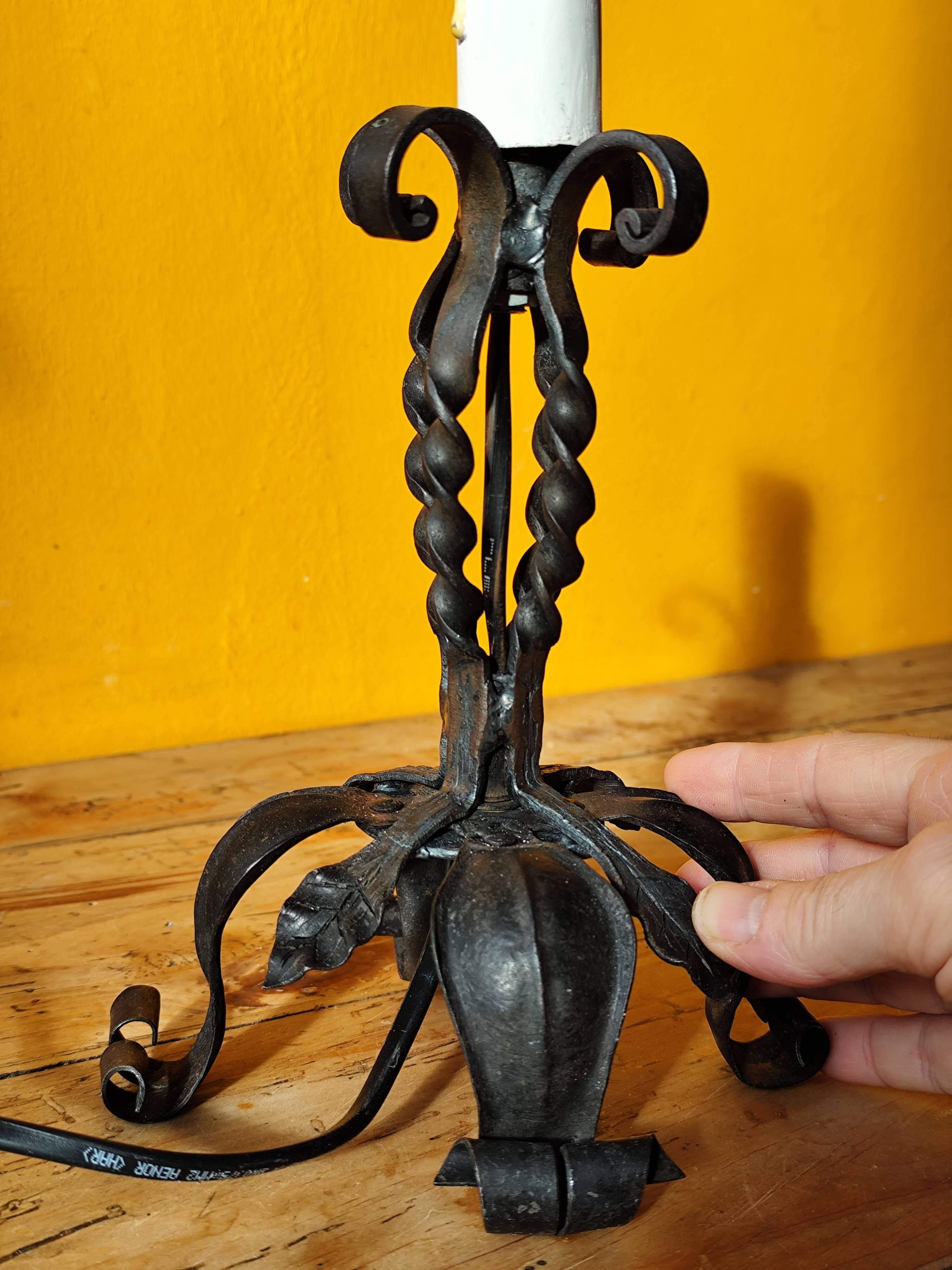 Old metal lamp and fake candle