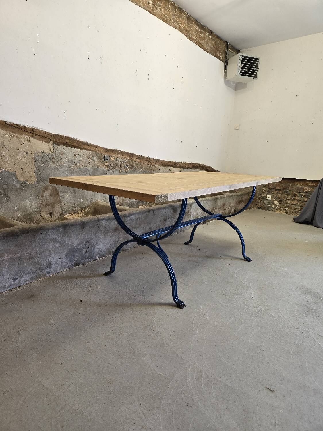 Wrought iron and solid wood table