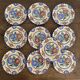 Henriot Quimper dessert plates, hand-painted earthenware.