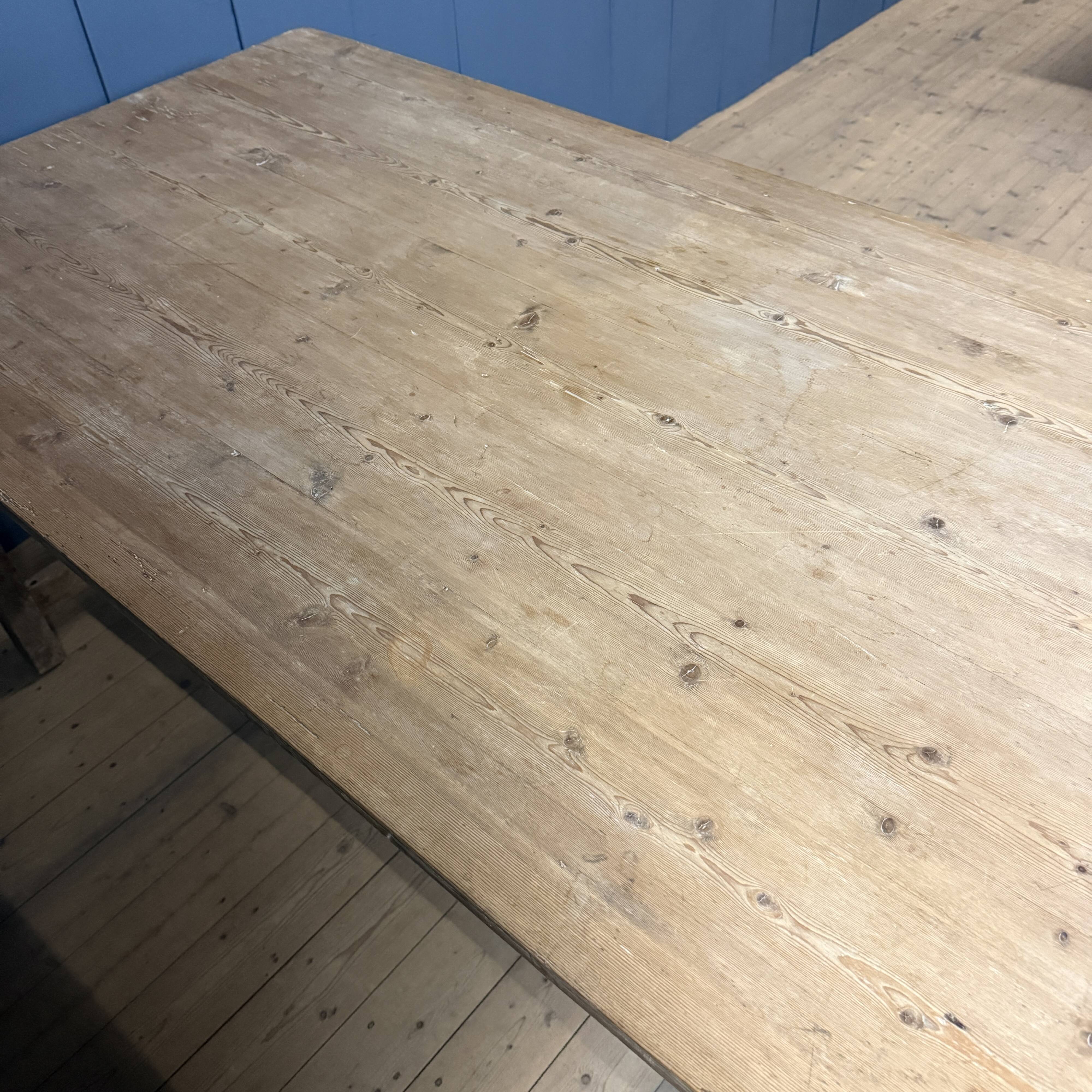 French farmhouse dining table with pine top and oak base