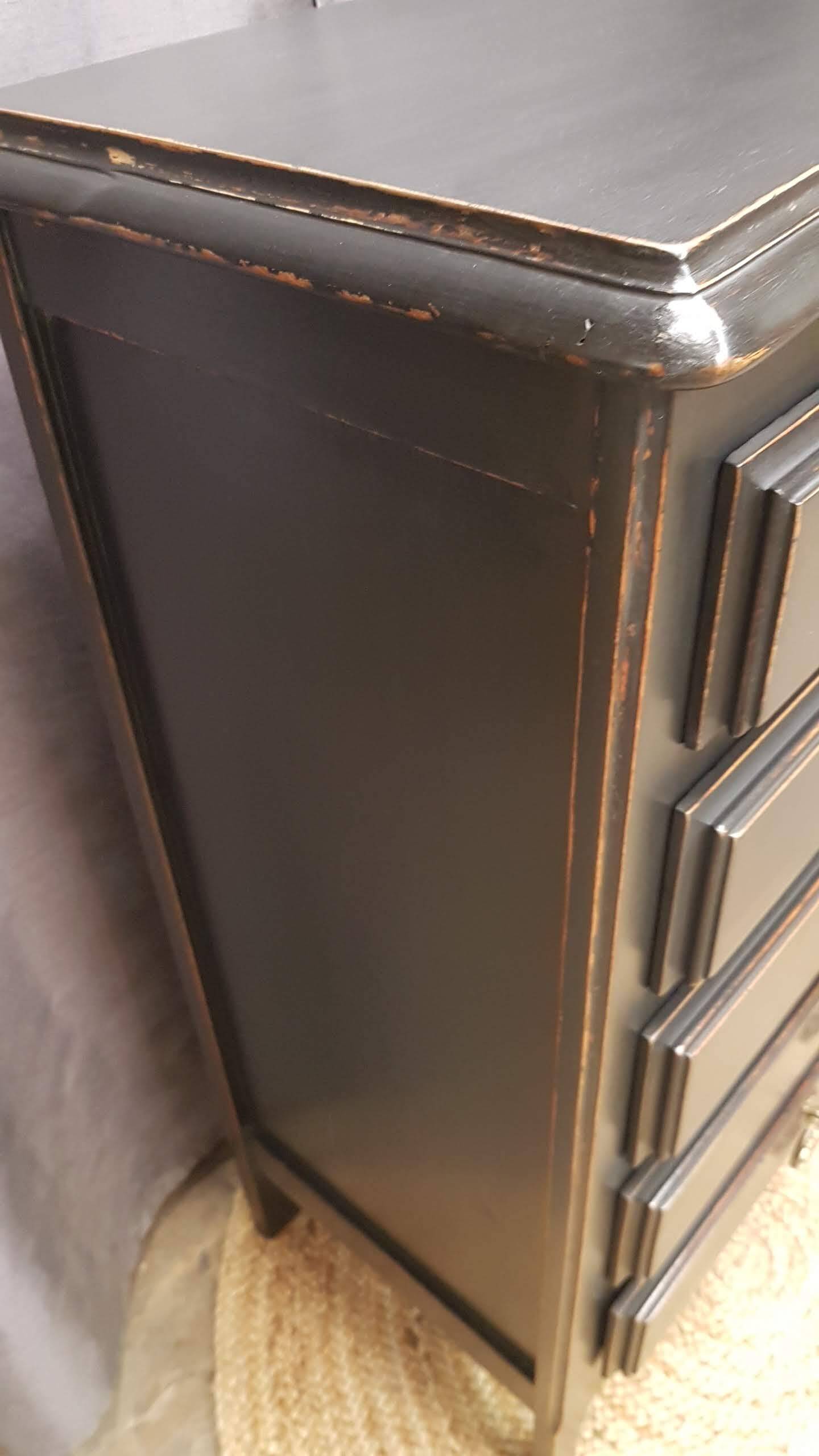 Cherry wood chest of drawers with 5 drawers in aged black.