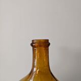 Old red glass demijohn