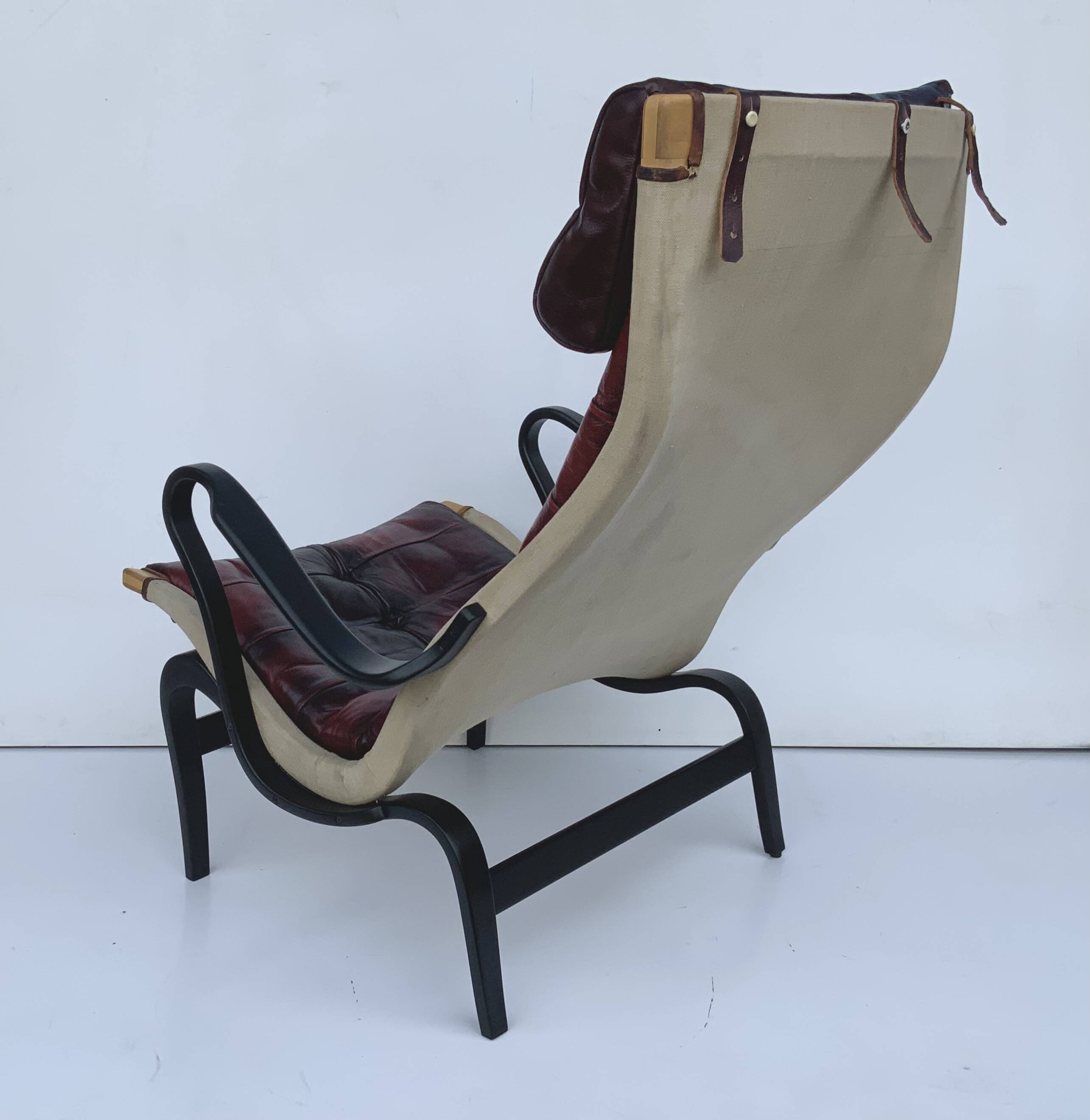 Vintage Pernilla 69 Armchair by Bruno Mathsson for Dux In Oxblood Leather