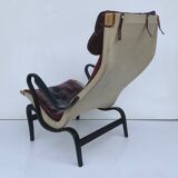 Fauteuil vintage Pernilla 69 de Bruno Mathsson pour Dux en cuir sang de bœuf