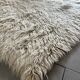 Large vintage carpet 100% pure wool Flokati with long pile from the 60s-70s.