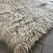 Large vintage carpet 100% pure wool Flokati with long pile from the 60s-70s.