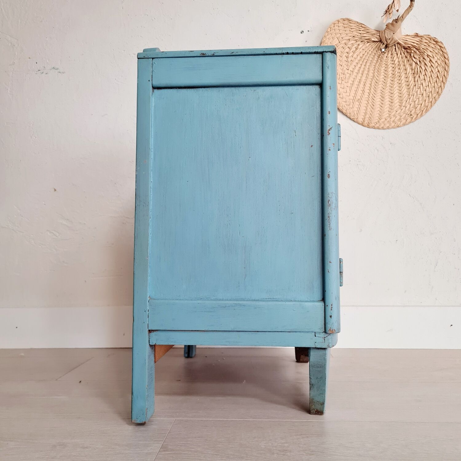 Old blue wood bedside table
