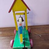 Ancien jouet à tirer en bois