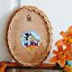 Oval rattan mirror from the 60s