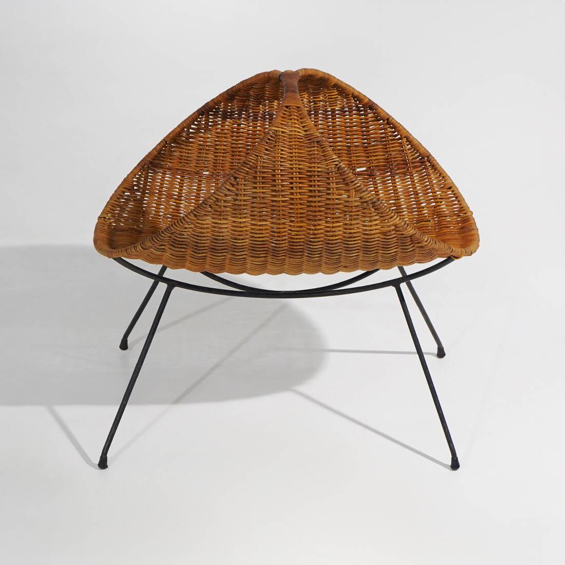 Rattan magazine rack with metal legs, 1950s