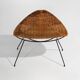 Rattan magazine rack with metal legs, 1950s