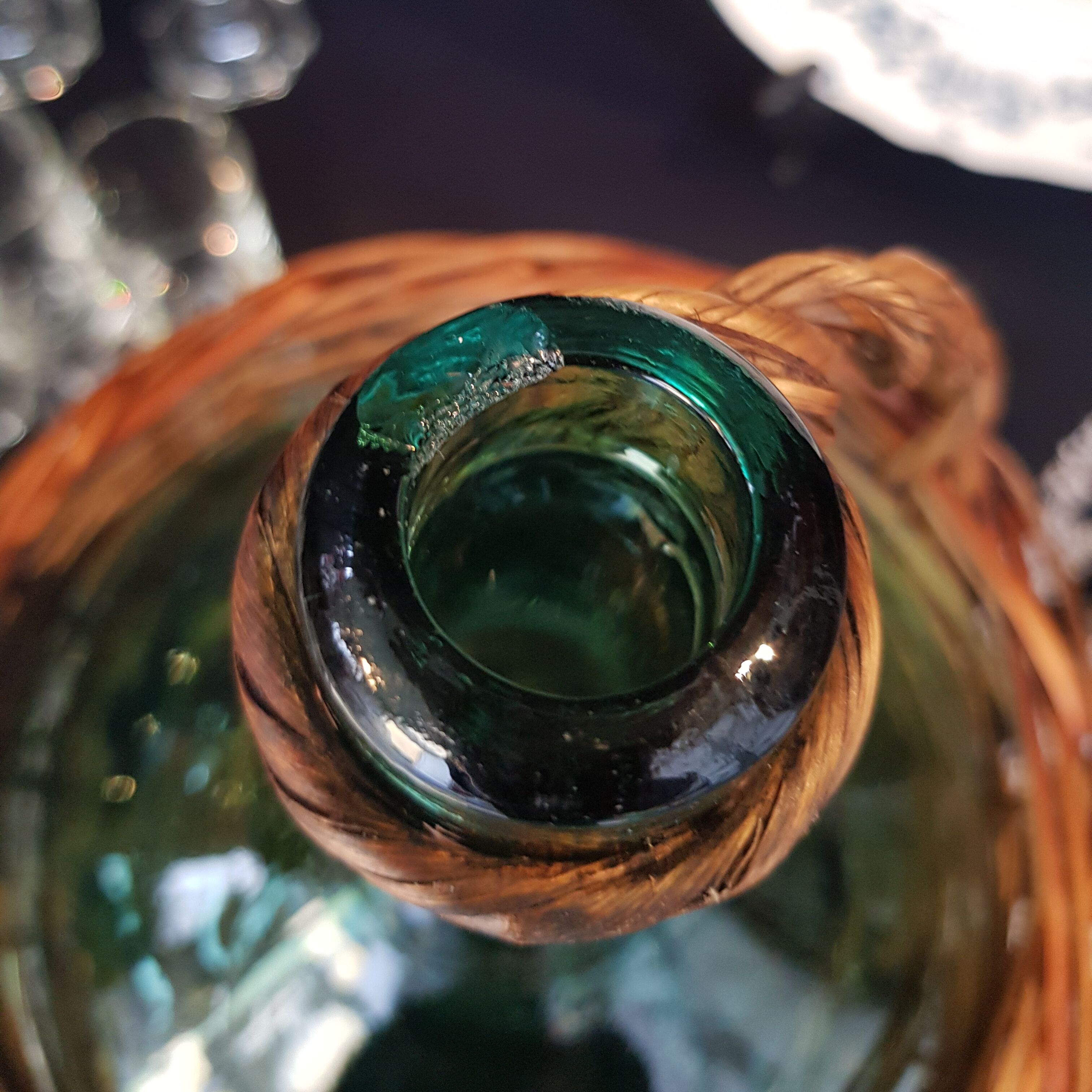 glass and rattan bottle