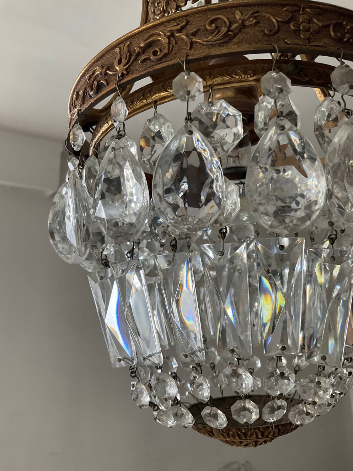 Old bronze basket chandelier with tassels