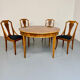 Round walnut Napoleon III extendable table with bronze top in good condition.
