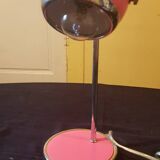 Pink desk lamp.