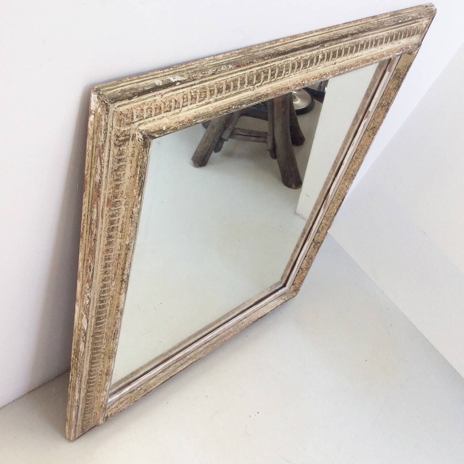 Antique mirror with Montparnasse frame channels