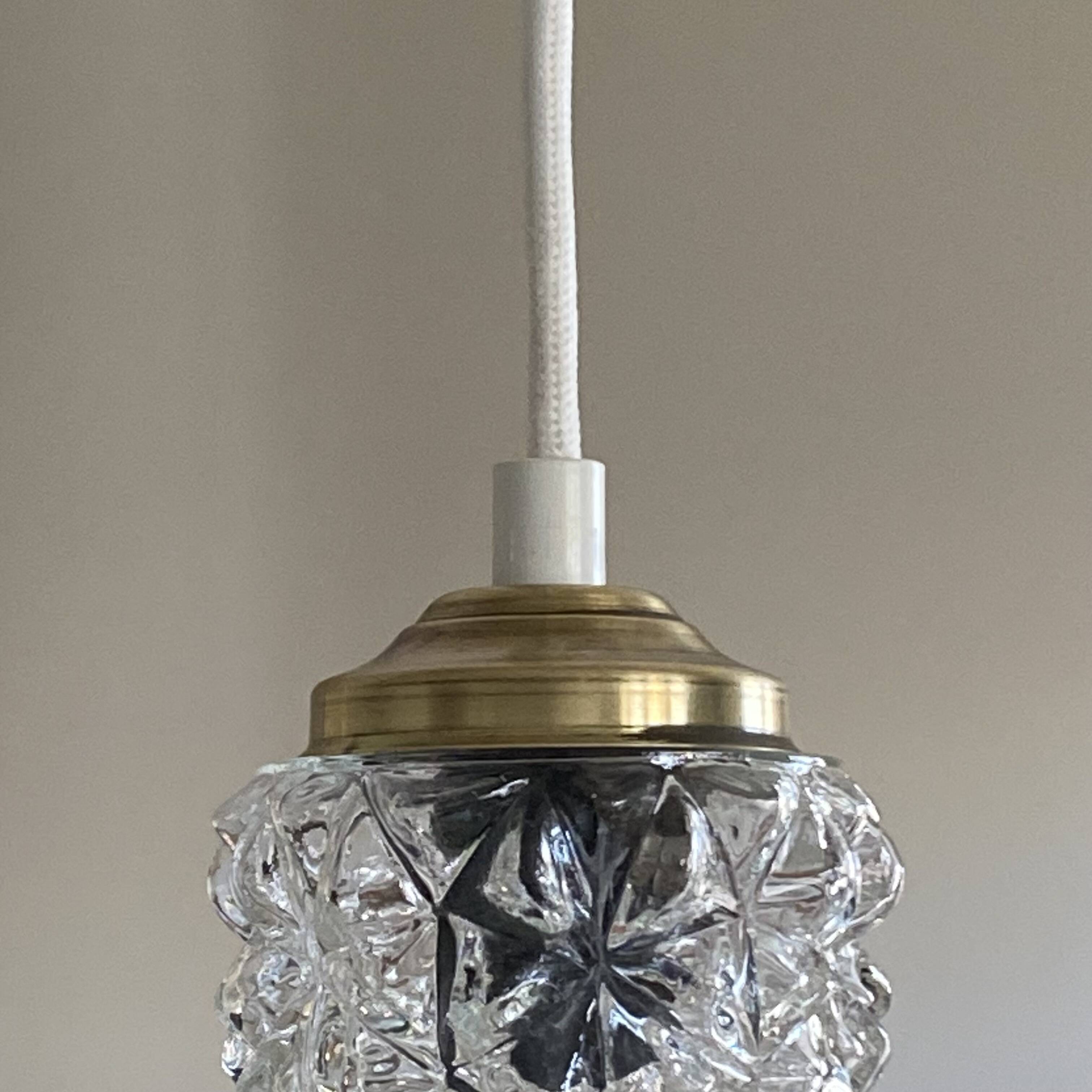 Cascade chandelier with 3 antique glass tulips, staircase