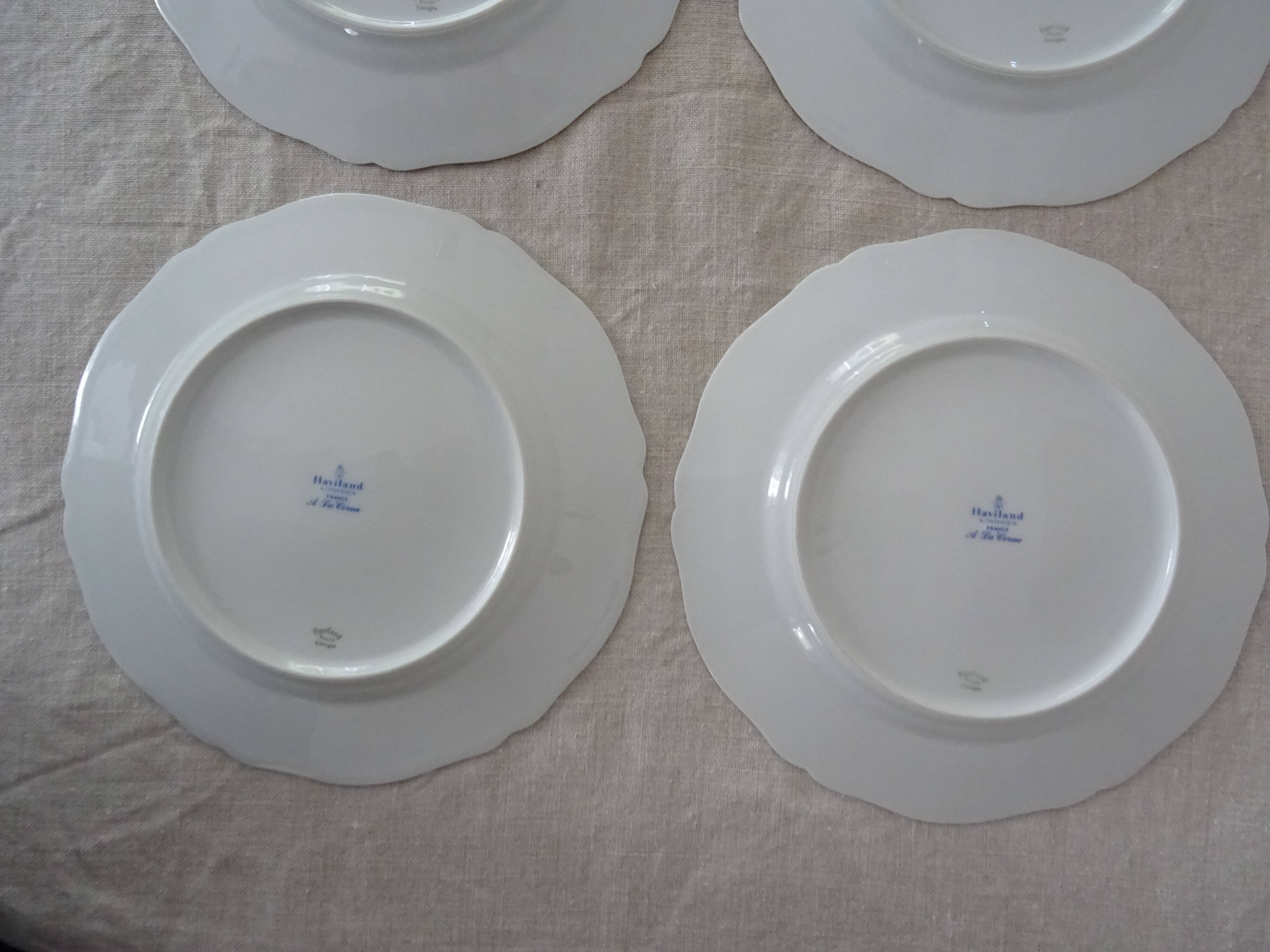 6 flat plates and 1 round dish haviland limoges with green and gold horn
