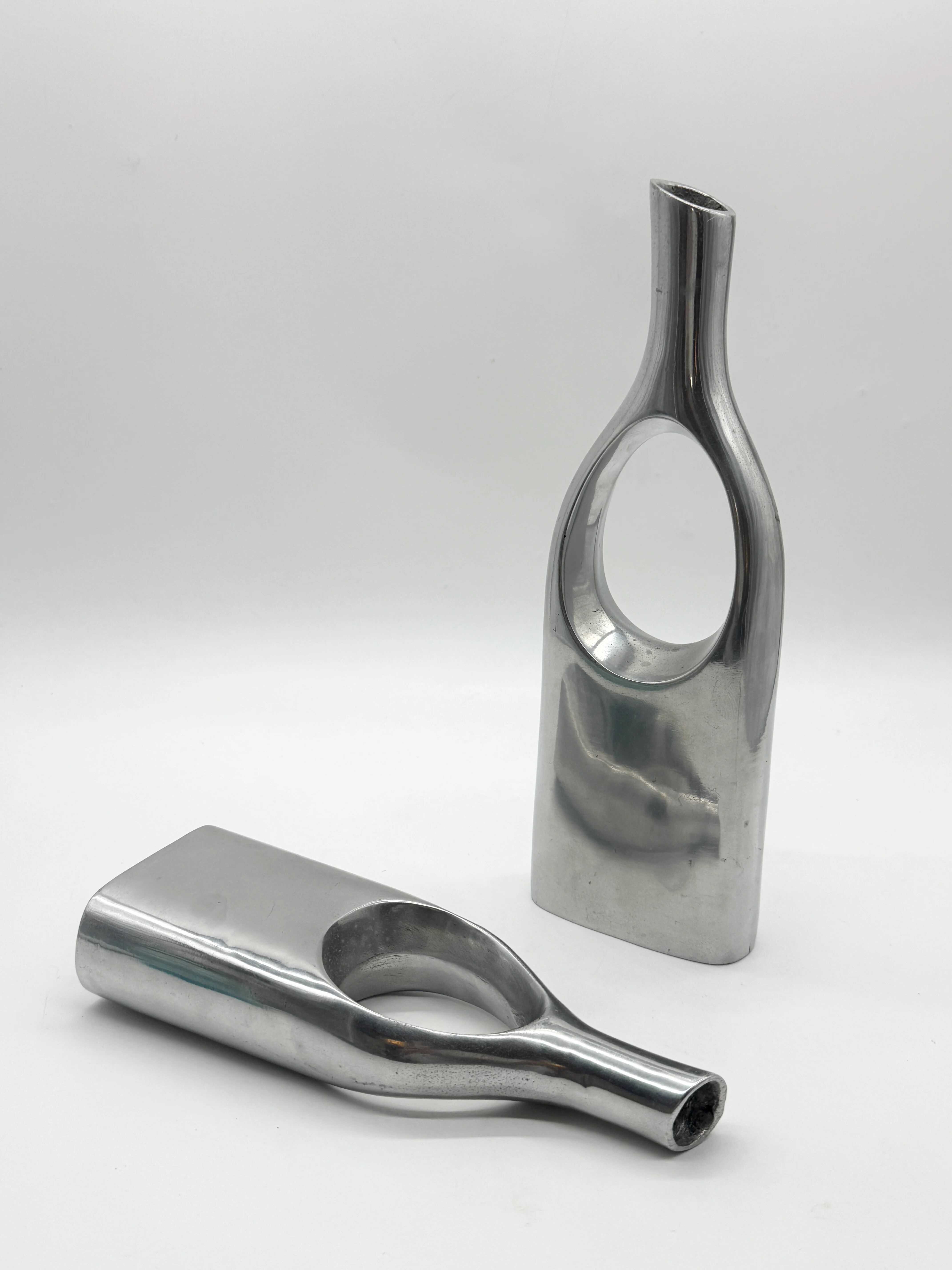 Pair of "drop" vases in aluminium cast, Italy, 1970s