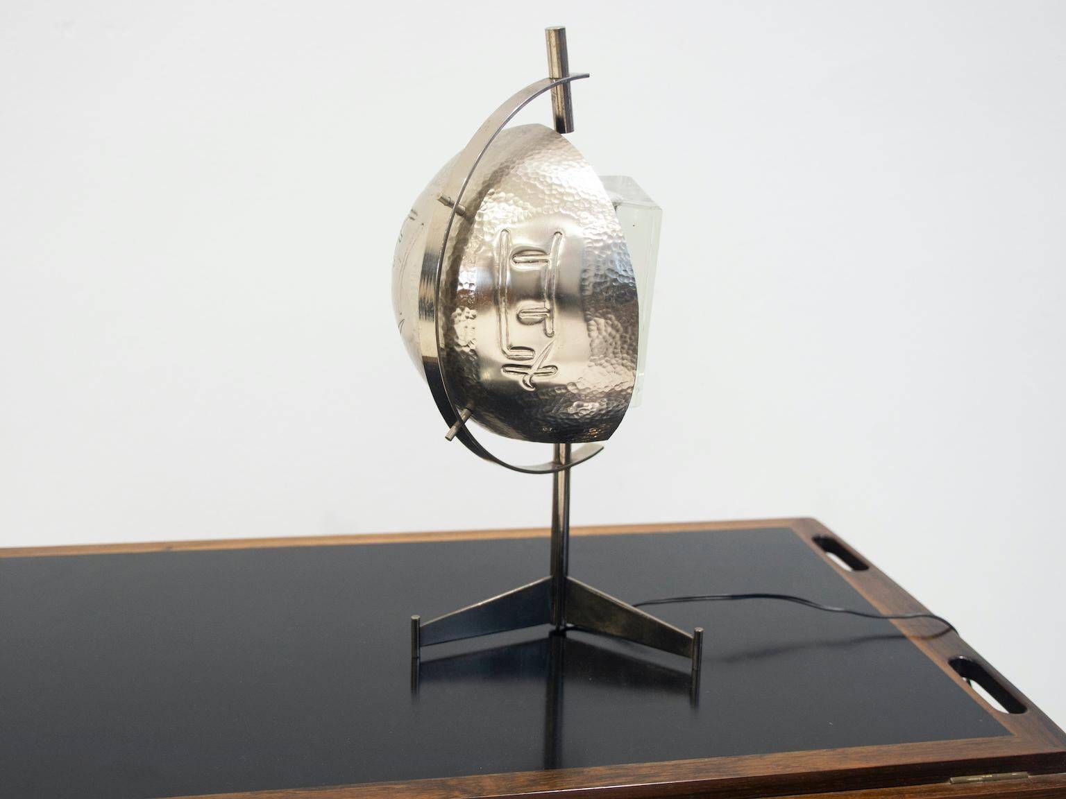 Metal table lamp with triangular glass light on tripod stand, 1970s.